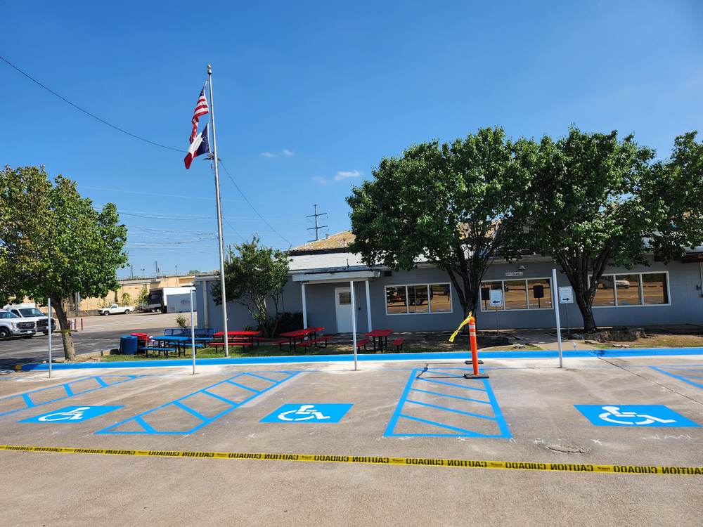 Blue-painted ADA accessible parking space