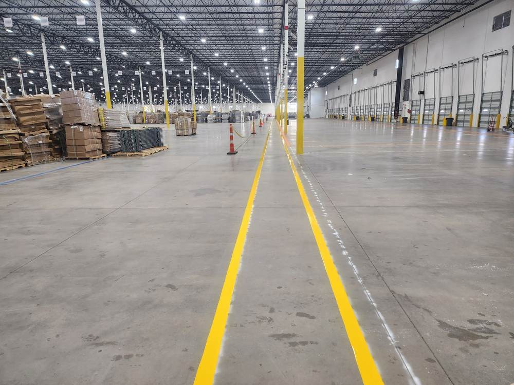 Warehouse floor striping, dual yellow traffic lanes